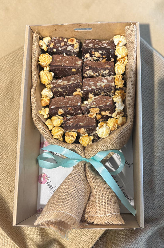 Donut Bouquet Canberra vegan brownie bouquet gift box with nuts and caramel popcorn wrapped in burlap and blue ribbon