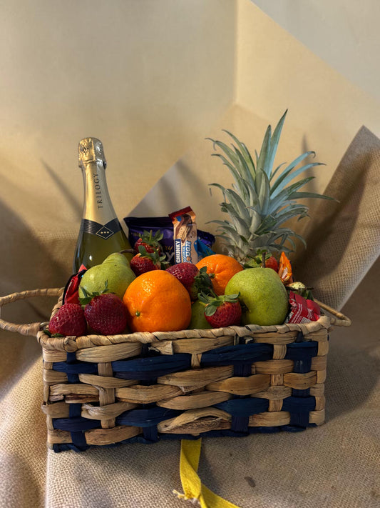Donut Bouquet Canberra gift hamper featuring sparkling wine, fresh pineapple, oranges, pears, strawberries, and chocolate