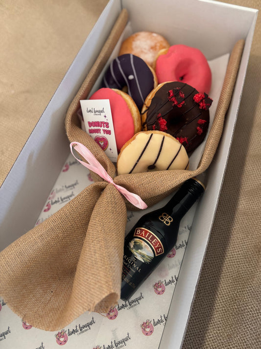 Donut Bouquet Canberra premium XL donut bouquet with six assorted glazed donuts and a mini Baileys bottle in a box