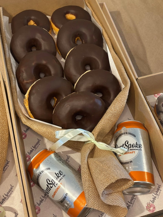 Donut Bouquet Canberra Chocolate Dream bouquet featuring nine oversized chocolate-glazed donuts wrapped in burlap.