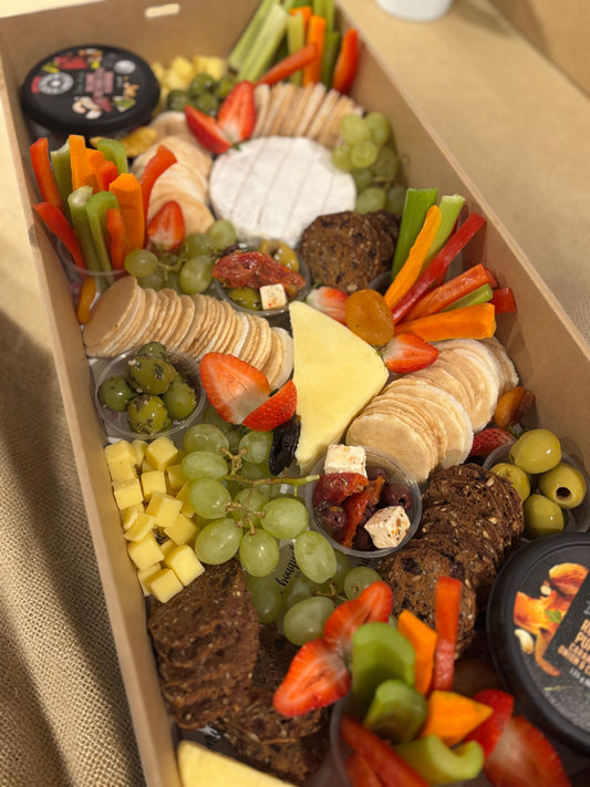 Donut Bouquet Canberra grazing box featuring salami rose, assorted cheeses, crackers, fresh fruit, and veggie sticks.