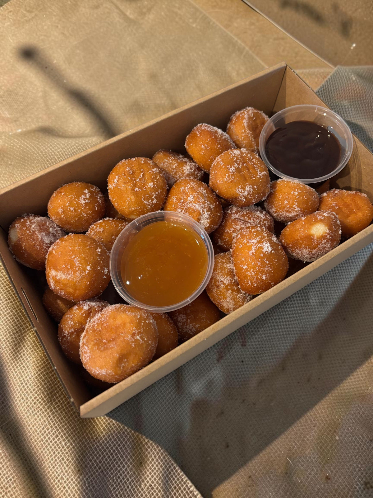 Donut Bouquet Canberra Donut Hole Box. Comes with 2 sauces, chosen by customer