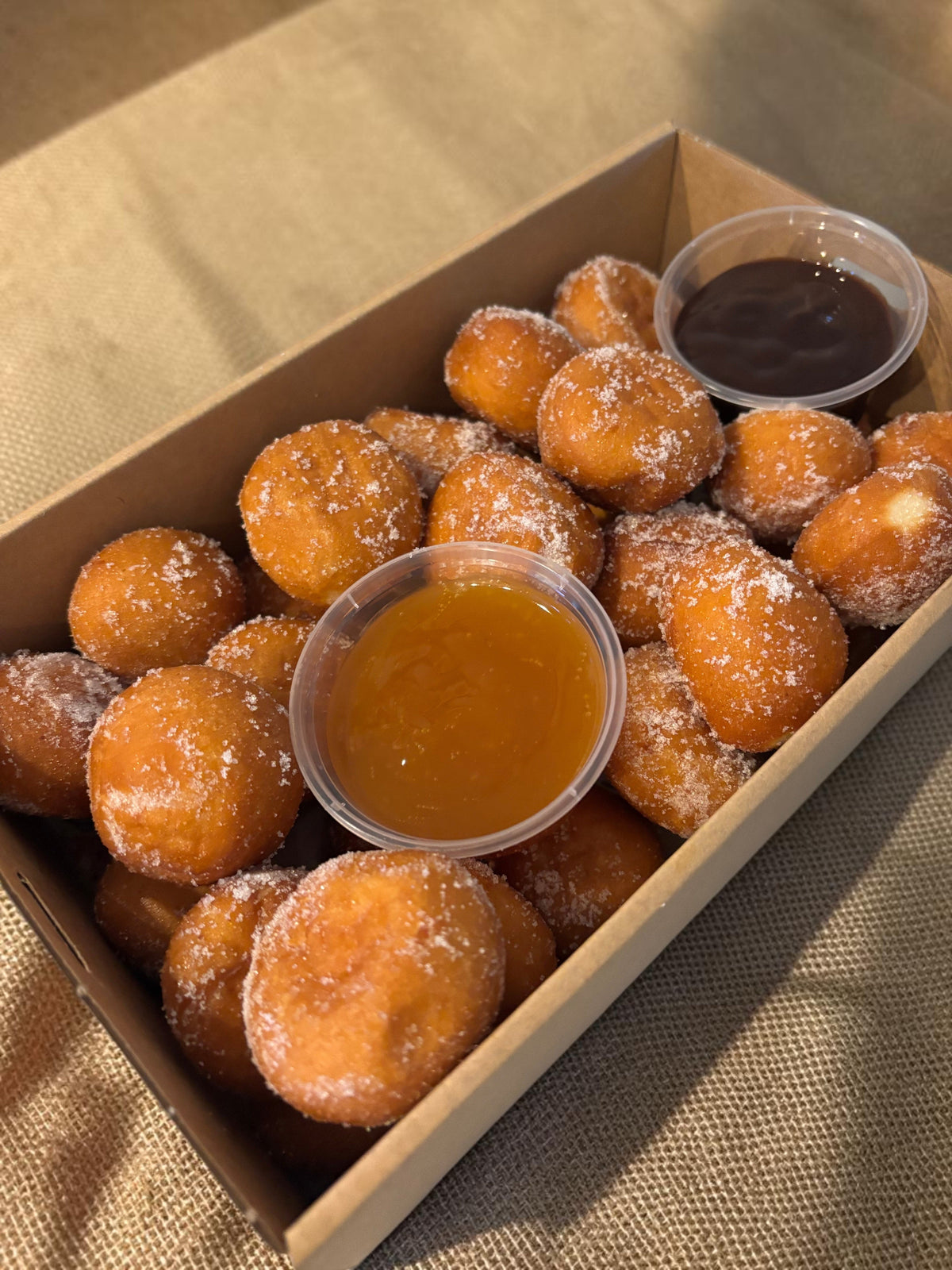 Donut Bouquet Canberra Donut Hole Box. Comes with 2 sauces, chosen by customer