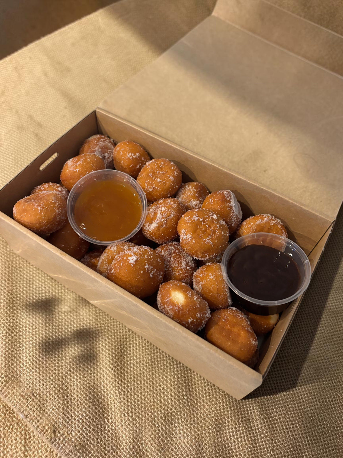 Donut Bouquet Canberra Donut Hole Box. Comes with 2 sauces, chosen by customer