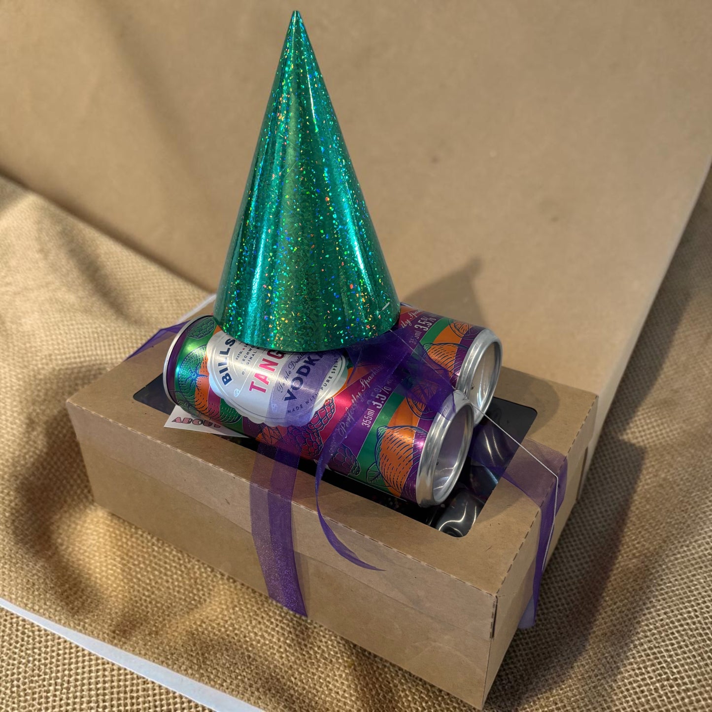 Donut Bouquet Canberra vegan birthday brownie gift box with vodka cans and a green glitter party hat