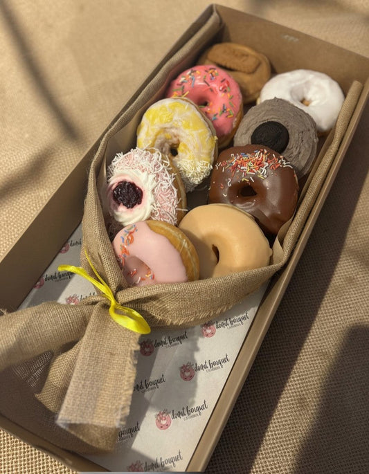 Donut Bouquet Canberra vegan donut bouquet featuring nine assorted glazed and topped donuts in a burlap wrap.