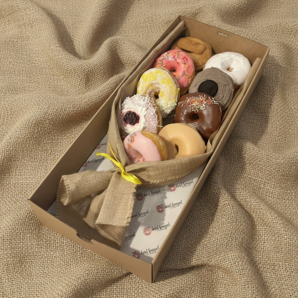 Donut Bouquet Canberra vegan premium bouquet featuring nine assorted XL donuts wrapped in hessian with a yellow ribbon.