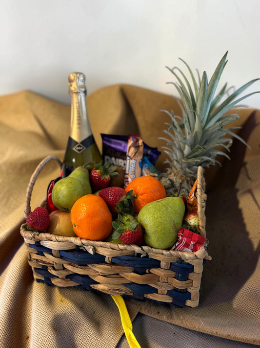Donut Bouquet Canberra gift hamper featuring sparkling wine, fresh pineapple, oranges, pears, strawberries, and chocolate