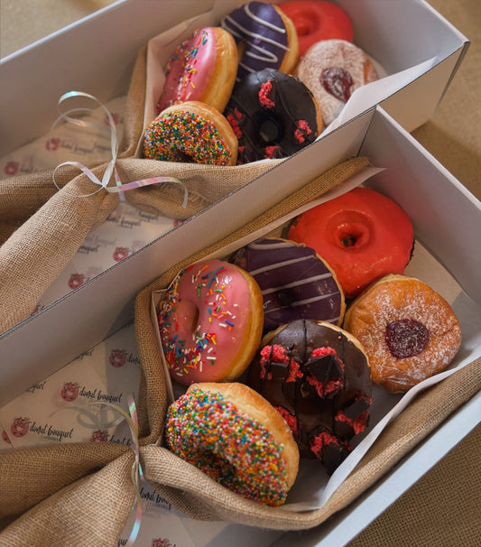 Donut Bouquet Canberra premium 6 pack XL donut bouquet featuring assorted glazed, sprinkled, and filled donuts.